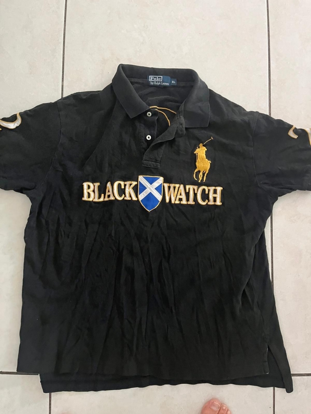 Ralph Lauren Black Polo with Gold Embroidery and Blue Shield Used.